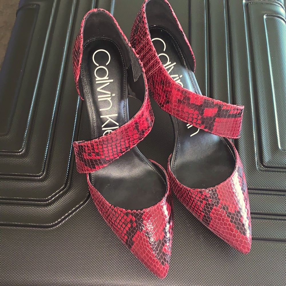 CK snakeskin pumps